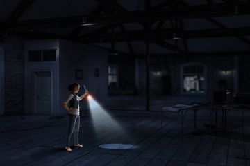 Fototapeta na wymiar Young woman holding a flashlight