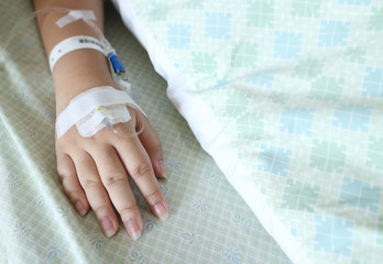 Focus on woman hand of a patient in hospital