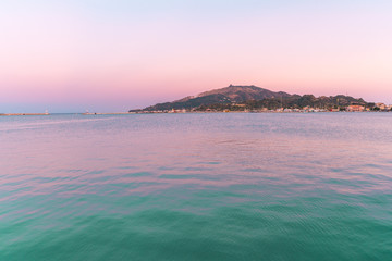 Fototapeta premium Stunning morning view of beach of Zakynthos (Zante) island. Sunny spring seascape of the Ionian Sea, Greece, Europe. Beauty of nature concept background.
