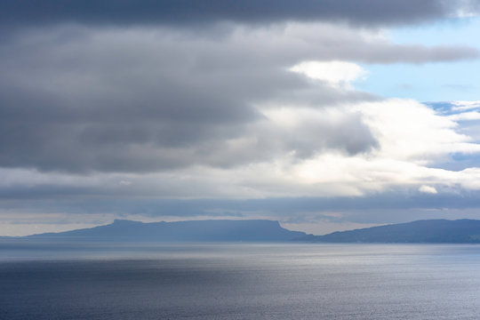 Moody sky above lake with islands.Beautiful landscape of Scotland ,UK.