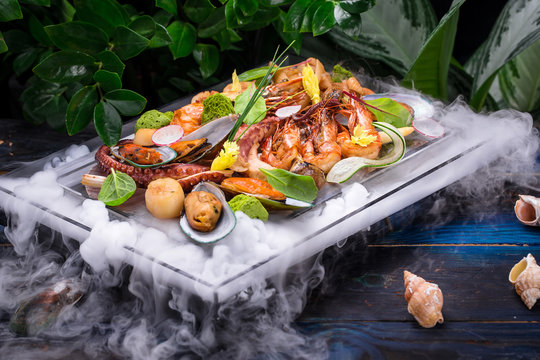 dish of seafood set on wooden table