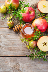 Rosh Hashana, jewish new year holiday concept, honey, apple, pomegranate