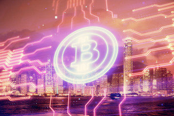 Obraz premium Multi exposure of cryptocurrency theme hologram drawing and city veiw background. Concept of blockchain and bitcoin.
