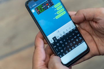 Writing alien messages with hieroglyphs on a smartphone