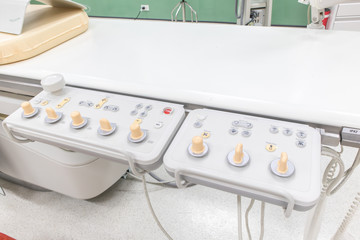 Digital Subtraction Angiography Room, DSA lab, Control panel large C-arm angiograph, operating room with X-ray medical scan in hospital.