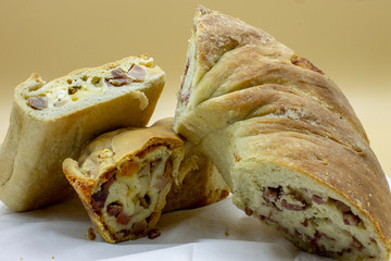 Naples. Il Casatiello a pizza stuffed with ham, cheese, eggs, salami, pepper.