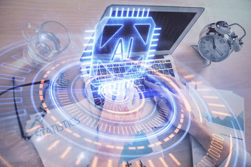 Businessman with computer background with technology theme hologram. Concept of big data. Double exposure.