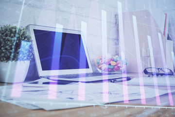 Fototapeta na wymiar Stock market graph and table with computer background. Double exposure. Concept of financial analysis.