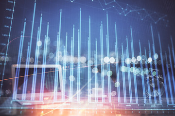 Forex Chart hologram on table with computer background. Double exposure. Concept of financial markets.