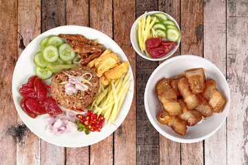 Isolated of Fried jasmine rice with shrimp paste,call Kao Klok Kapi in Thai, with sidedish.