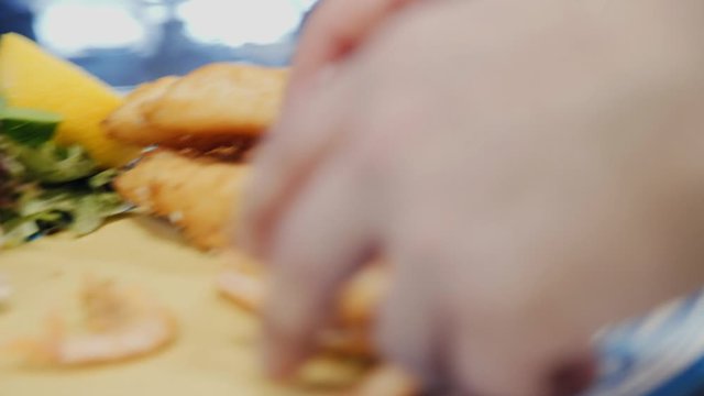 Seafood in a batter. Preparation of shrimp in batter. Squids in batter. Shrimps in batter. 