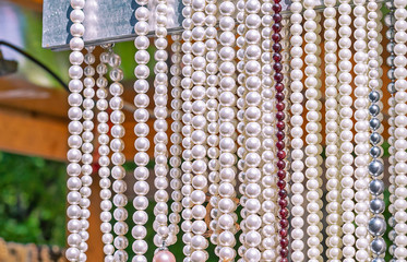 Pearl beads. Round river pearls. Pearl background.