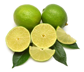 Lime fruit whole, half and slices with leaf isolated on a white background. Creative juice concept. Flat lay, top view