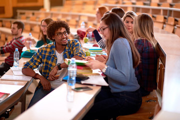 .multi-ethnic students in university engaged in education..