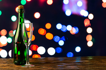 champagne bottle on bokeh background