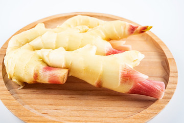 Fresh ginger on white background