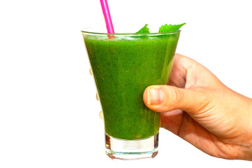 Green smoothie of kiwi, banana and apple in hand