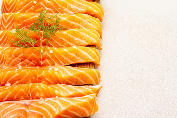 Slices of fresh salmon. Ingredient for cooking healthy seafood. Concept omega 3 containing food