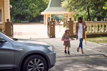 happy mother and dugther after first day of school