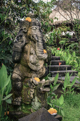 Stone Ganesha statue in garden