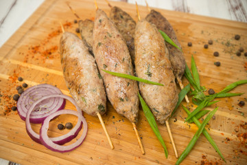 kebab. Fried meat on sticks.  - 284327579