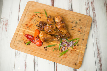 fried chicken legs with spices and vegetables. Grilled chicken. - 284327704