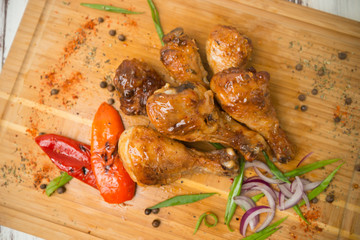fried chicken legs with spices and vegetables. Grilled chicken. - 284327729