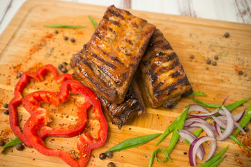 grilled ribs with vegetables. Pork. - 284327782