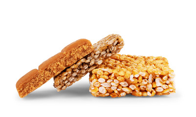 Peanut kozinaki, sesame and sunflower on a white. Isolated
