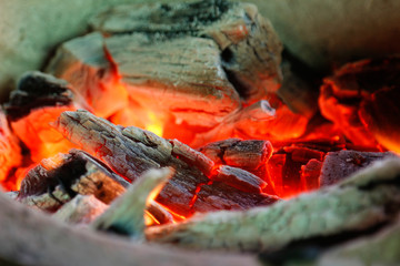Burning coal in stove for cooking 