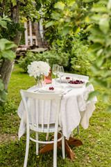 Outside table set with flowers