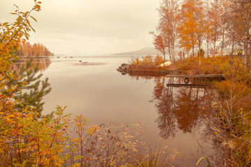 Autumn between villages  nature and water in Scandinavia