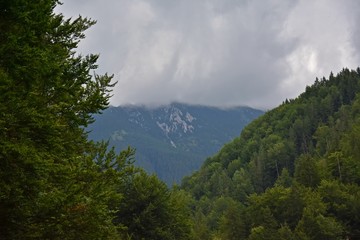 Landscape of mountains and cloudy sky.
