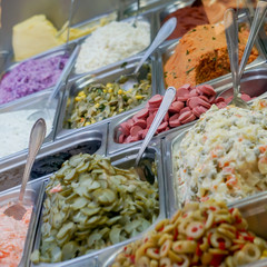 Turkish colorful street food. Sausage, pickle, olive 