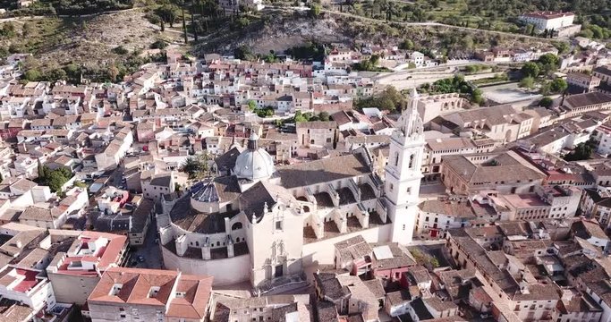 Aerial panoramic view of Xativa cityscape with Collegiate Basilica of Santa Maria, Spain