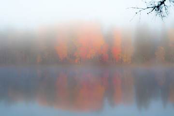 Beautiful autumn morning landscape of Kymijoki river waters in fog. Finland, Kymenlaakso, Kouvola.