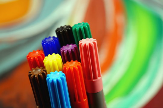 set of colored pens markers on bright colored background with copy space. Office Supplies, Felt tip, supplies for home, office and back to school projects. abstract Elements for design and background.