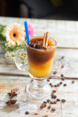 cocktail in a glass on a wooden table