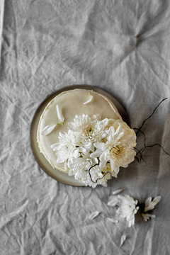 White blossoms wedding cake on the table 