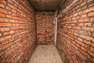 Room with brick walls.