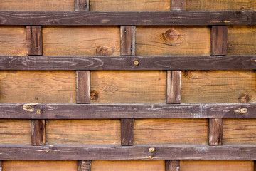 Wood texture. Decorative wooden bricks. Creative design. The medieval wall.