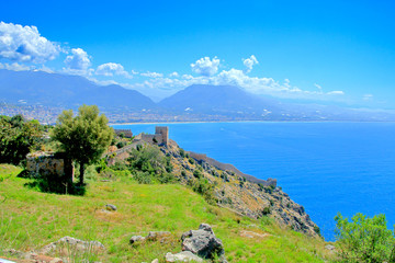 Seascape with an ancient fortress in the city of Alanya.