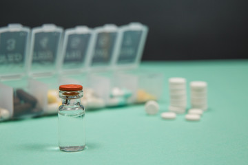 Medical ampoules, syringe and pills