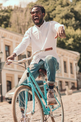 Obraz premium Putting hand up on the bike stock photo