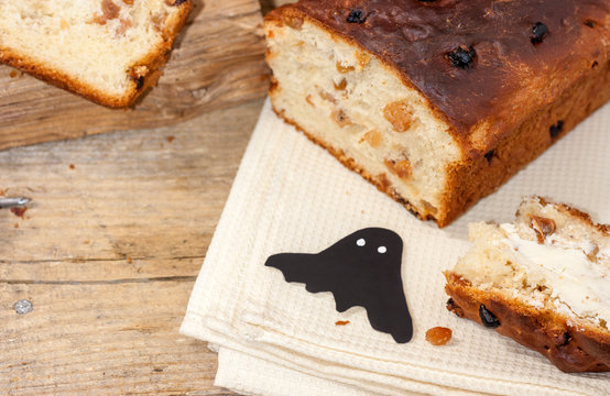 Barmbrack or bairin breac is a traditional Irish sweet yeast bread with grapes and raisins, often eaten with afternoon tea butter and traditionally served on Halloween.