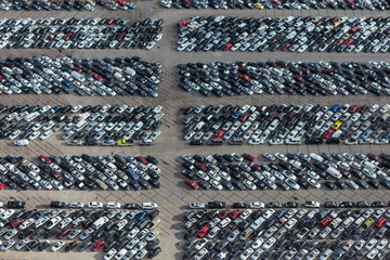 Aerial view of packed used automobile storage lot. © trekandphoto