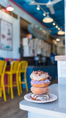 Donuts stacked on plate
