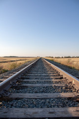 Fototapeta na wymiar railway tracks go into the horizon
