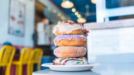 Donuts stacked on a plate