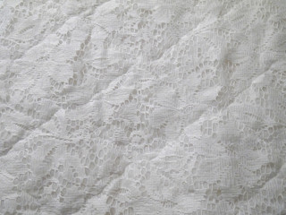 Background from a white lace tablecloth.